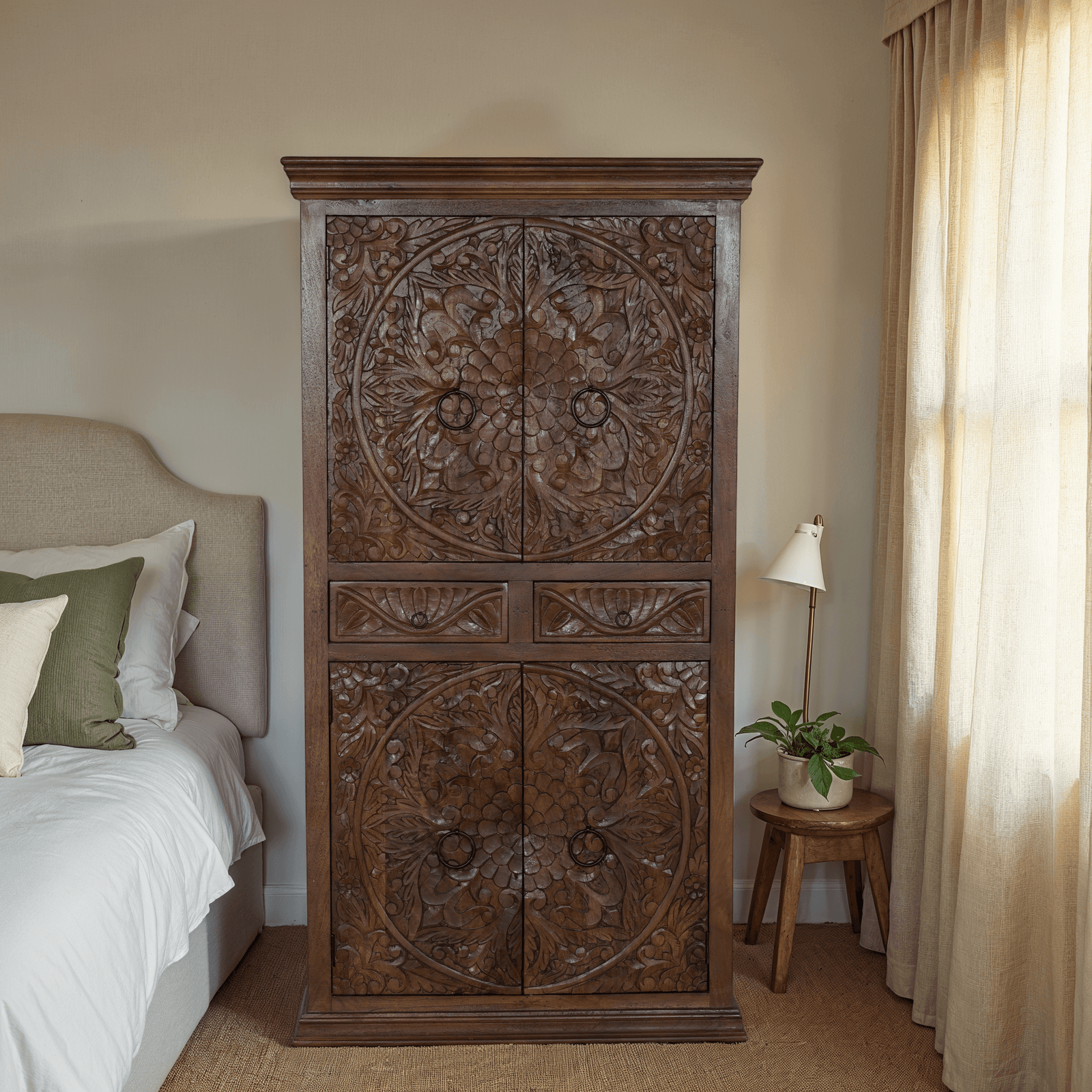 Modern farmhouse bedroom styled with a hand carved mango wood wardrobe, white linen bedding, and warm neutral tones"Introduction
