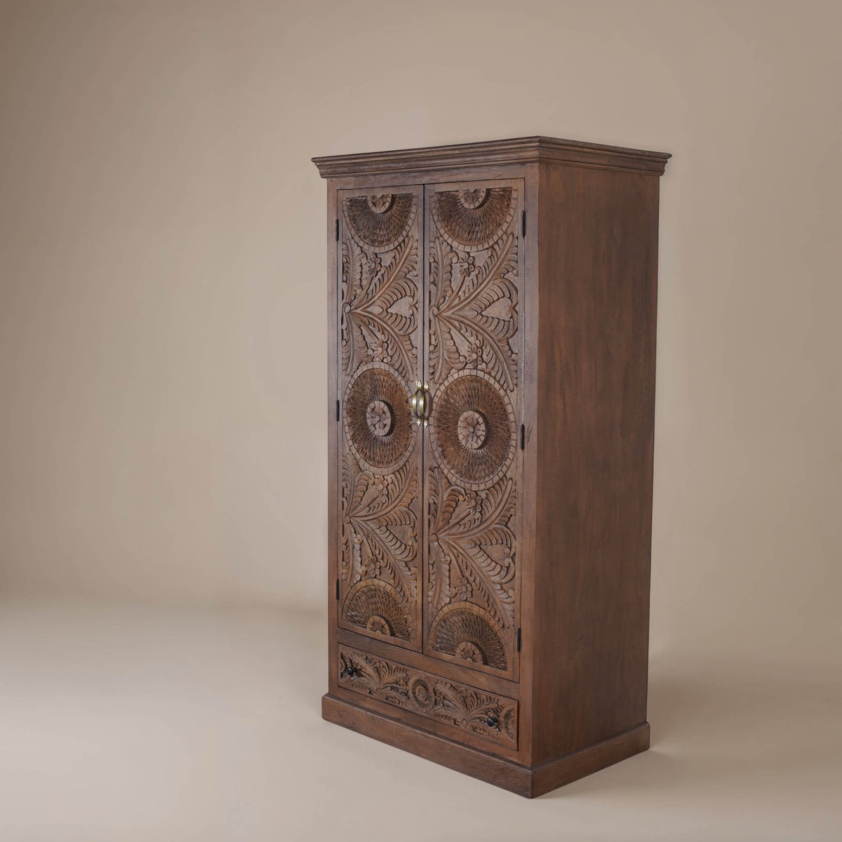 Sienna hand-carved mango wood armoire, studio view of carved doors