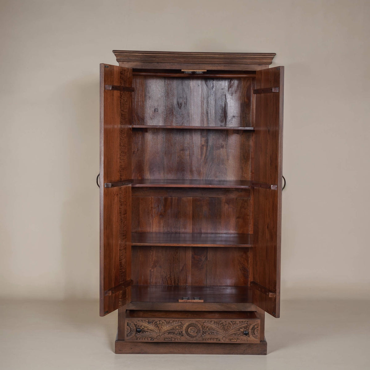Sienna hand-carved mango wood armoire, studio detail of carved panels