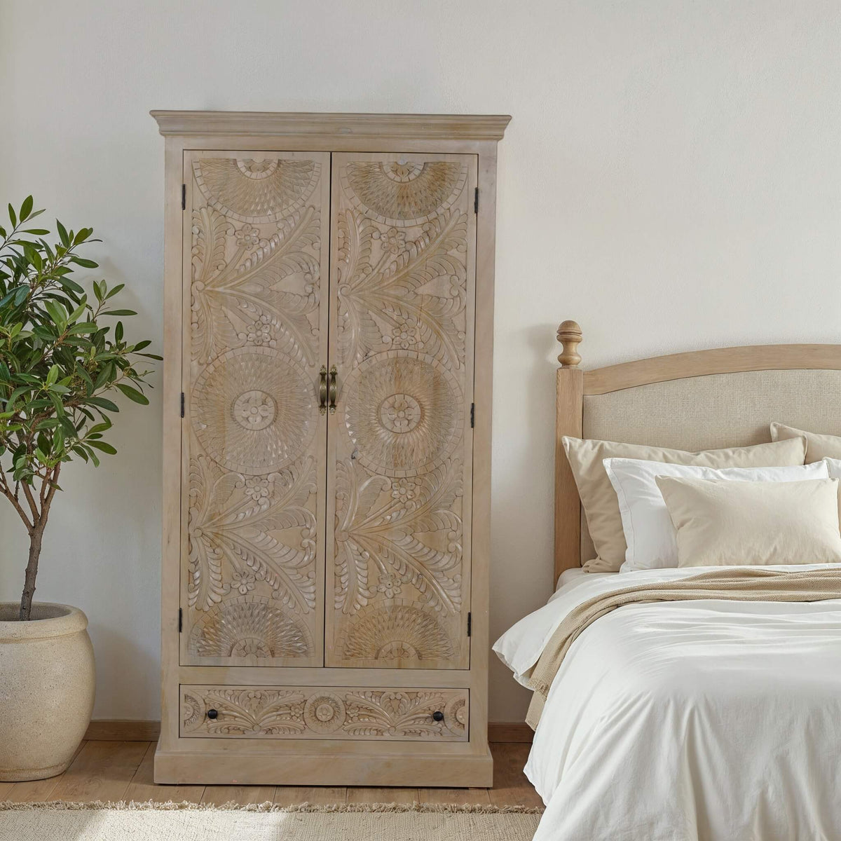 Birch hand-carved mango wood armoire, studio front view of carved sunburst doors